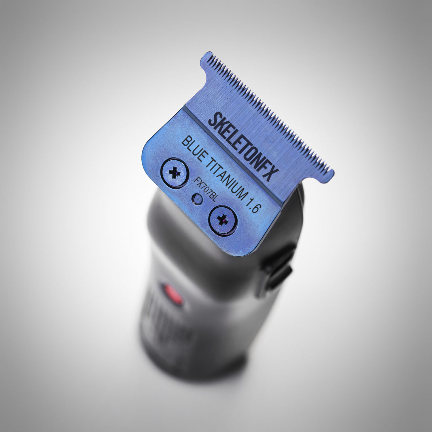 Blue Titanium blade on top of trimmer